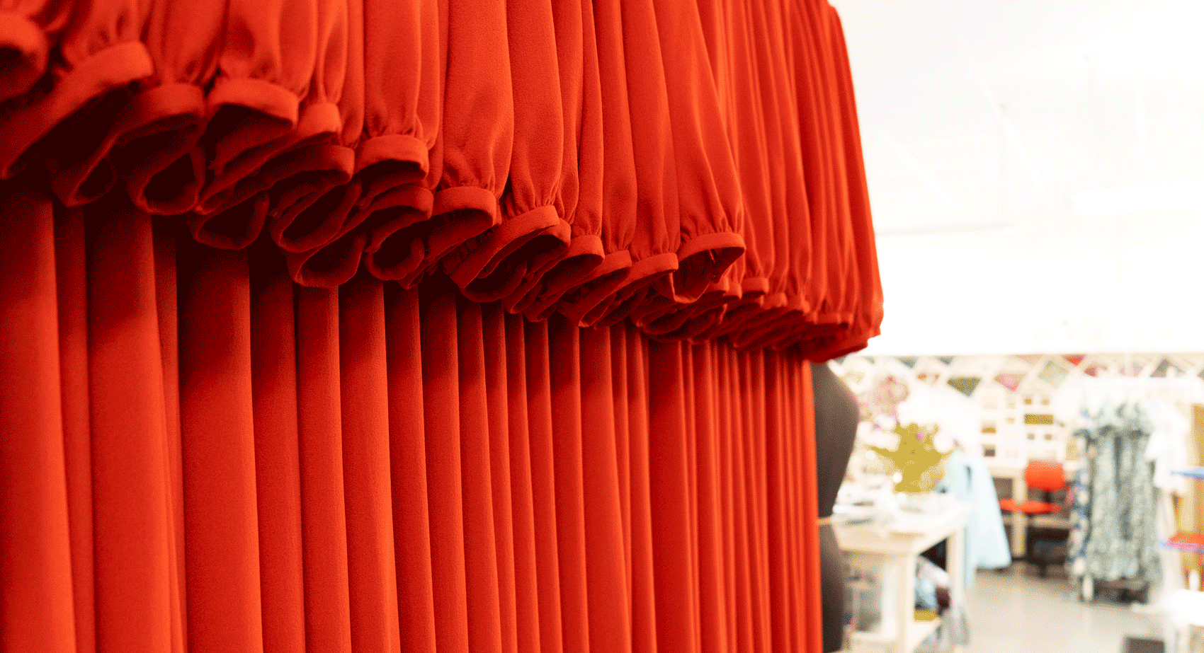 Red Dresses On a Rail